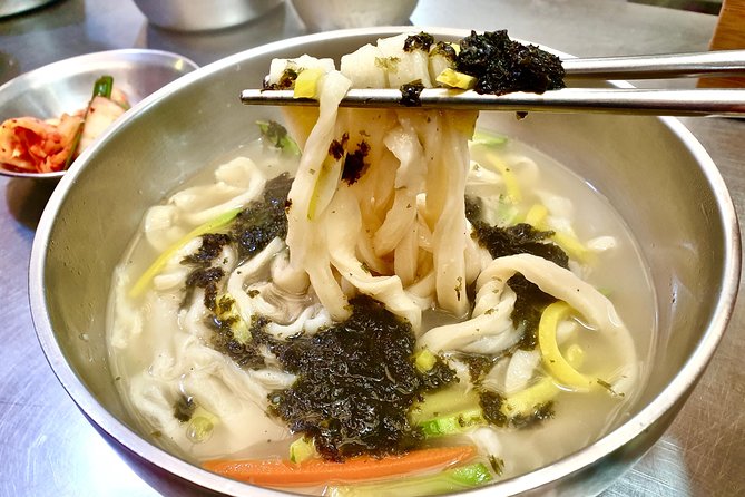 Downtown Seoul Guided Food & Market Tour with 8+ Local Tastings - Bukchon Hanok Village Walk: Traditional Village Context