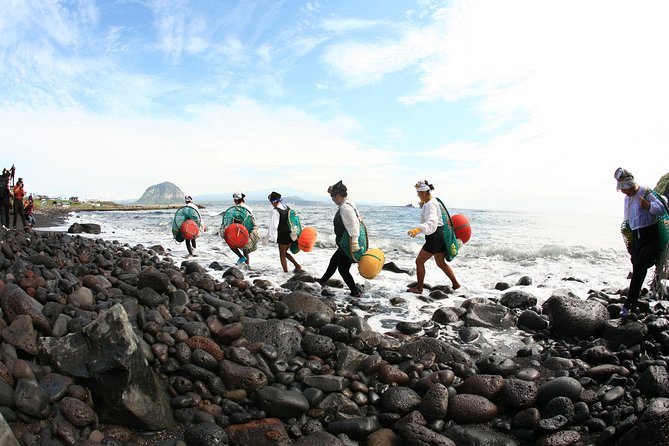 East Jeju Essentials – Seongsan Ilchulbong (UNESCO) & Haenyeo - Stop 3: Gwangchigi Beach, coastal drama with seasonal surprises