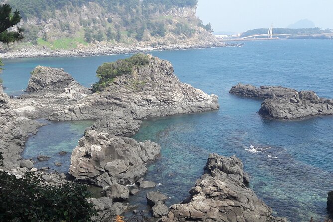 Full-Day Private Taxi Tour South of Jeju Island - Stop 5: Jeongbang Waterfall, where water meets the sea