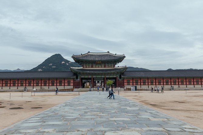 Highlights & Hidden Gems With Locals: Best of Seoul Private Walking Tour - Stop 1: Gwangjang Market, street snacks and old-school Seoul