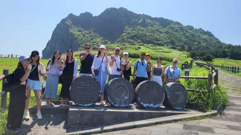 Jeju: Eastern UNESCO Sites Tour with Haenyeo Show - Seopjikoji: cliffs, open fields, and K-drama filming energy
