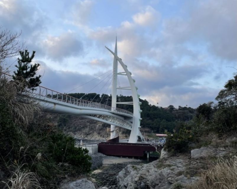 Jeju: Seogwipo City Walking Tours with Sunset - Saeseom island walk, nature views with a photo-ready finish