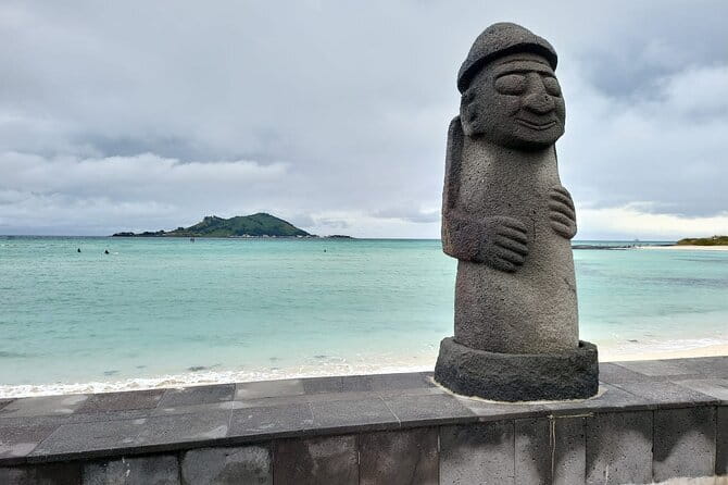 Jeju Unesco Eest course Package Private Van Guided Tour - Stop 3: Gwangchigi Beach, with a Seongsan Ilchulpeak side view