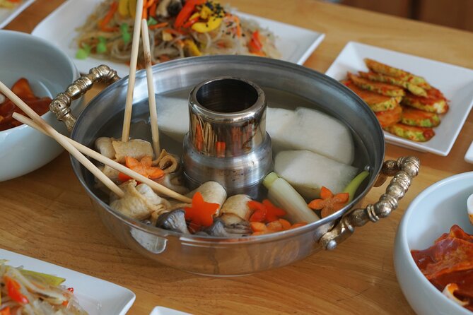 K-food cooking Japchae Mandu Tteokbokki & Fishcake - How the class keeps you moving, from plating photos to dessert breaks