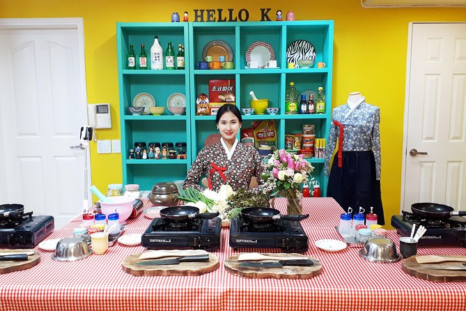 Local Home Korean Cooking Class & Market Adventure in Seoul - Hanjeongsik dinner with 10+ side dishes, dessert, and makgeolli