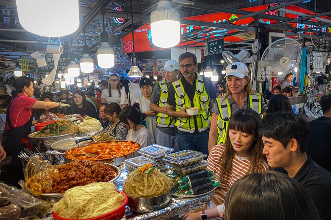 Market Food Tour & Evening E-bike Ride in Seoul - Cheonggyecheon Stream: the calm intro before the city gets intense