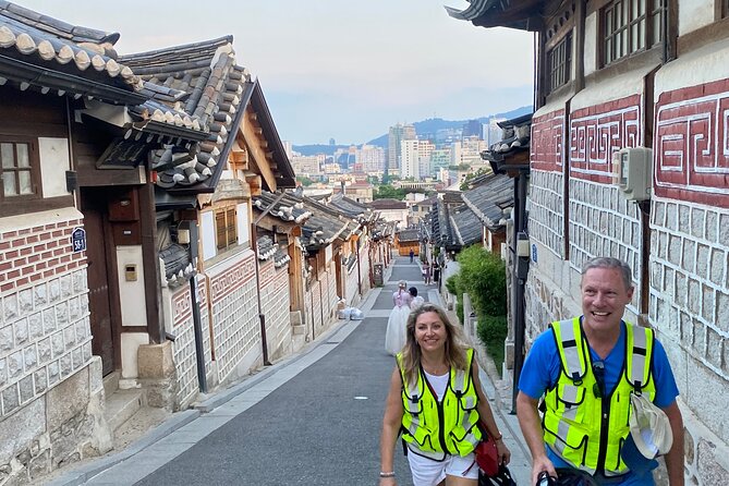 Market Food Tour & Evening E-bike Ride in Seoul - Bukchon Hanok Village: famous lanes and quieter photo spots