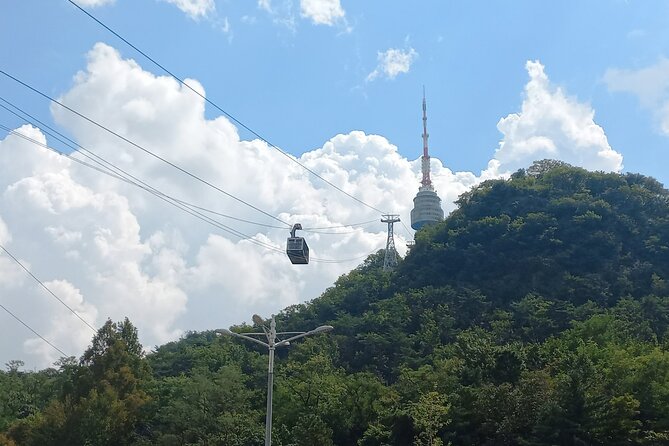 Private Full Day Seoul City Tour and N Tower Cable Car - Bukchon Hanok Village: old houses, quick breathing room