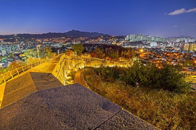 Seoul City Night View and Foodie Walking Tour - Cheonggyecheon Stream at night: calm water, great pacing