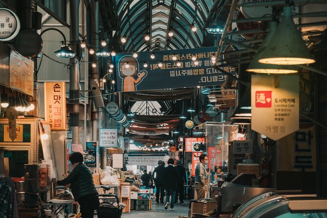 Seoul Night Palace & Market Food Tour with Vehicle - Changgyeonggung Palace after dark, and the stories that shape the view