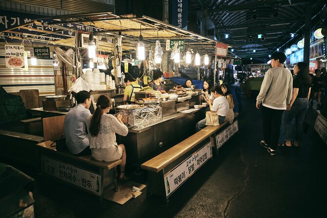 Seoul Night Palace & Market Food Tour with Vehicle - The moment you choose to try live octopus or raw beef