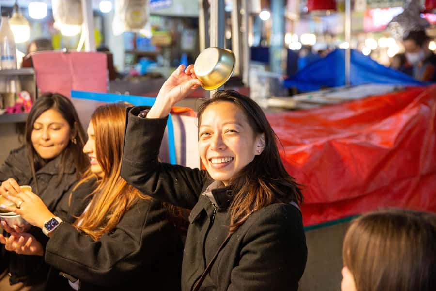 Seoul: Palace, Temple and Market Guided Foodie Tour at Night - Gwangjang Market street-food tastings: Makgeolli, jeon, and one daring choice