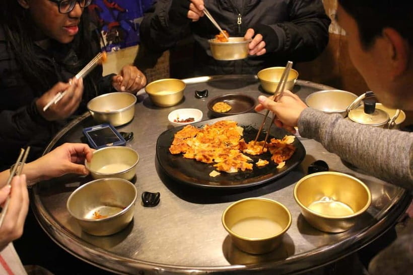 Small-Group Night Dining Tour: 10 Tastings With KBBQ Course - What you eat: kimchi, savory pancakes, spicy rice cake, and more