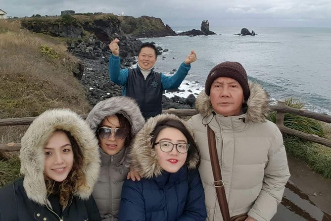 UNESCO Jeju Full Day Tour Package By Taxi - Stop 4: Seopjikoji for coastal views and canola-season color